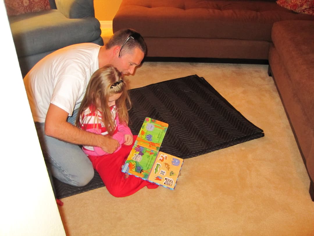 Practitioner reading with child during Functional Synthesis session — learning through connection