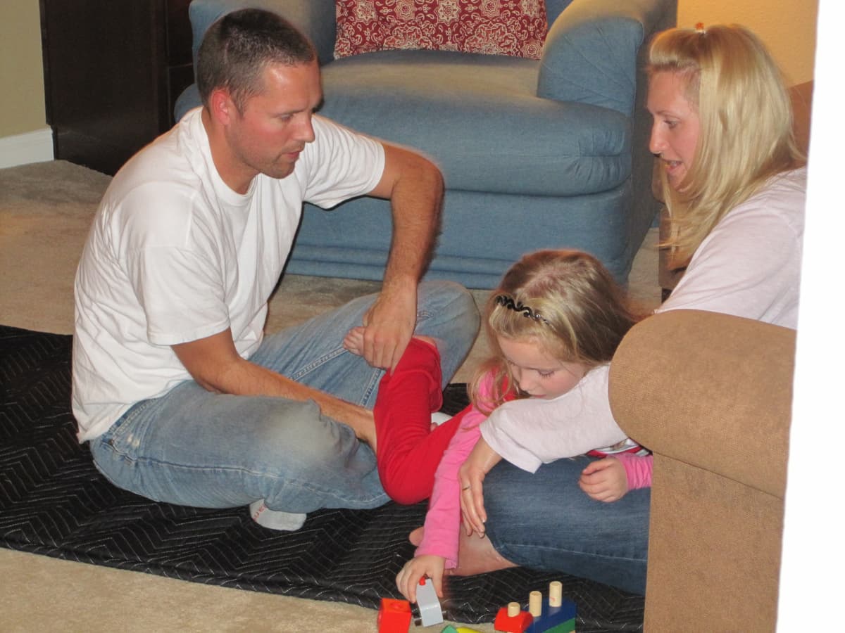 Bryan Thunstrom working with a child in a Functional Synthesis session while mother participates